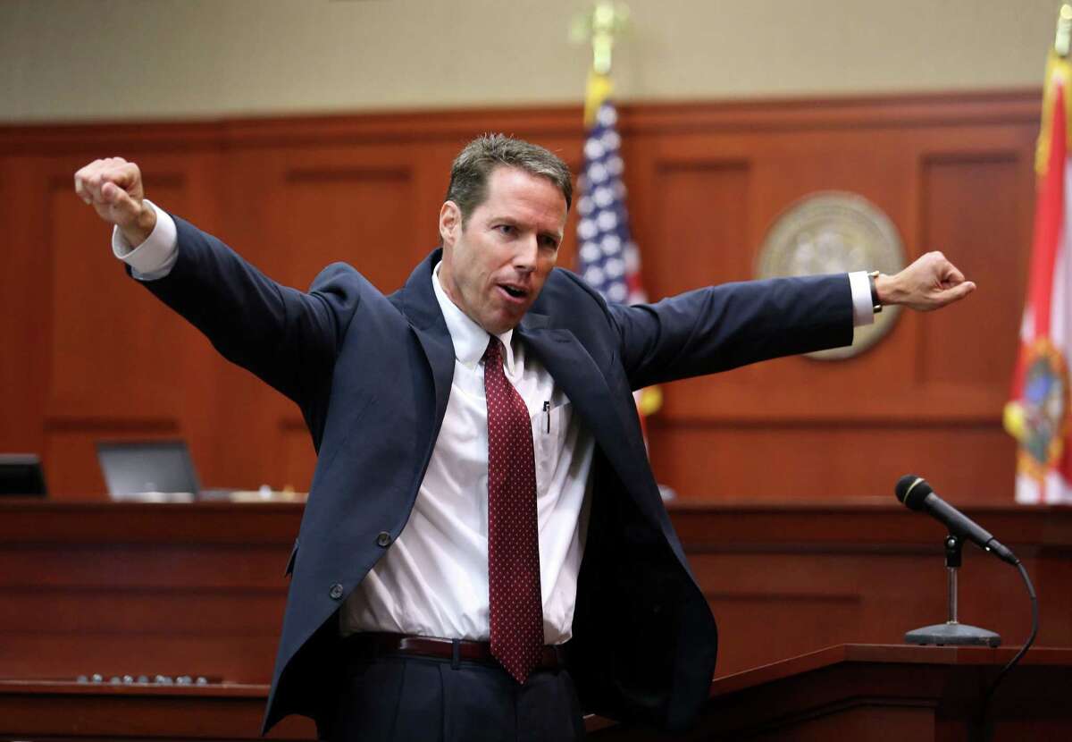 Prosecutor John Guy gestures during his opening statement in George Zimmerman's trial on second-degree murder charges in the death of Trayvon Martin.