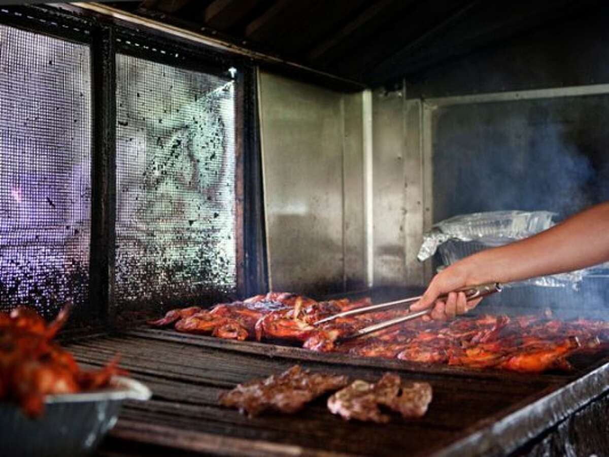 60. KARANCHO'S: lunch is on the grill in Channelview. (Todd Spoth photo)