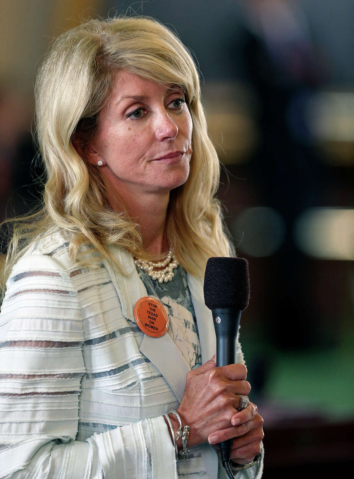 Fort Worth Senator Wendy Davis shows signs of fatigue as she filibusters in an effort to cause abortion legislation to die without a vote on the floor of the Senate Tuesday, June 25, 2013.