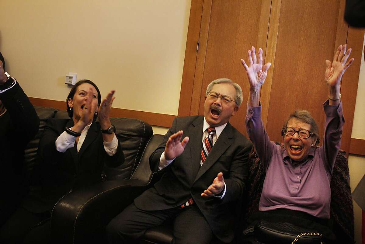 Joyce Newstat (l to r), Mayor Ed Lee and Phyllis Lyon react as they listen to coverage of the Supreme Court rulings in the Mayor's Office at City Hall on Wednesday, June 26, 2013 in San Francisco, Calif.