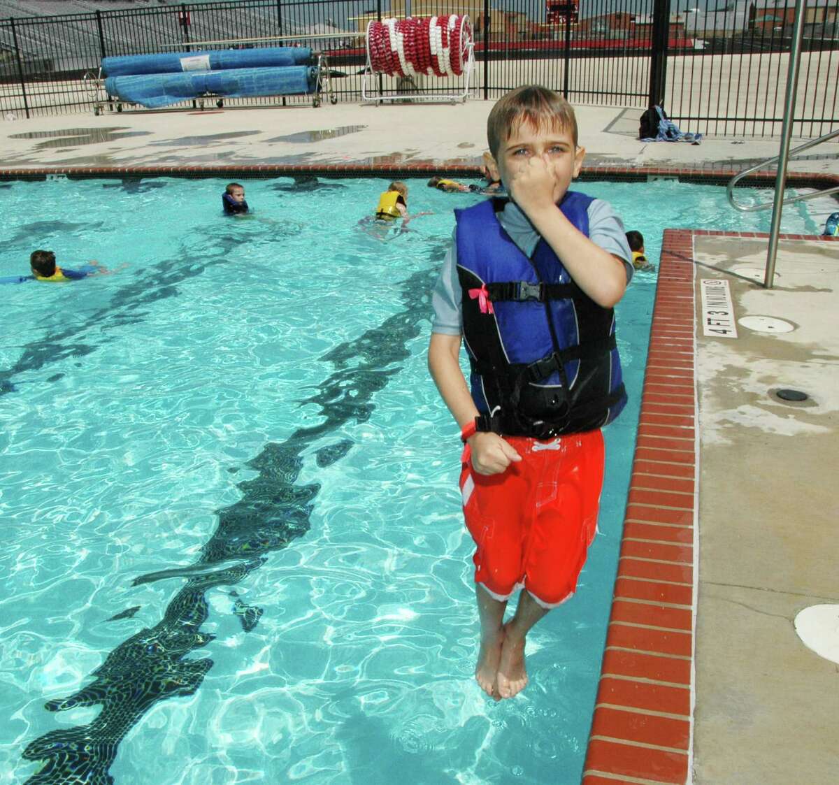 Jackson Stevens is ready for a splash into the Canyon High pool during Comal ISD's School Age Child Care summer program. Students in the program visit either the Canyon High or Smithson Valley High pool twice a week to take a break from the summer heat.