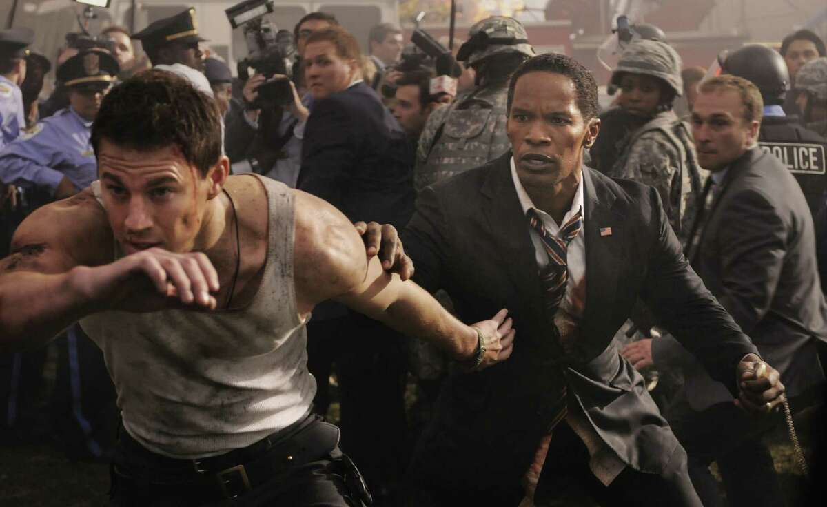 Channing Tatum (left) has the lead, but Jamie Foxx steals the show in “White House Down.”