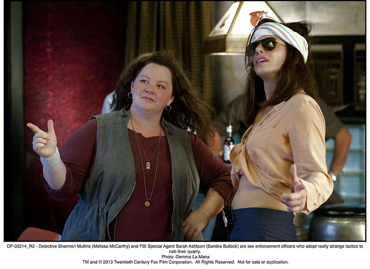 DF-02214_R2 - Detective Shannon Mullins (Melissa McCarthy) and FBI Special Agent Sarah Ashburn (Sandra Bullock) are law enforcement officers who adopt really strange tactics to nab their quarry.