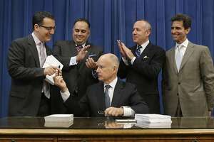 Gov. Brown proudly signs balanced state budget