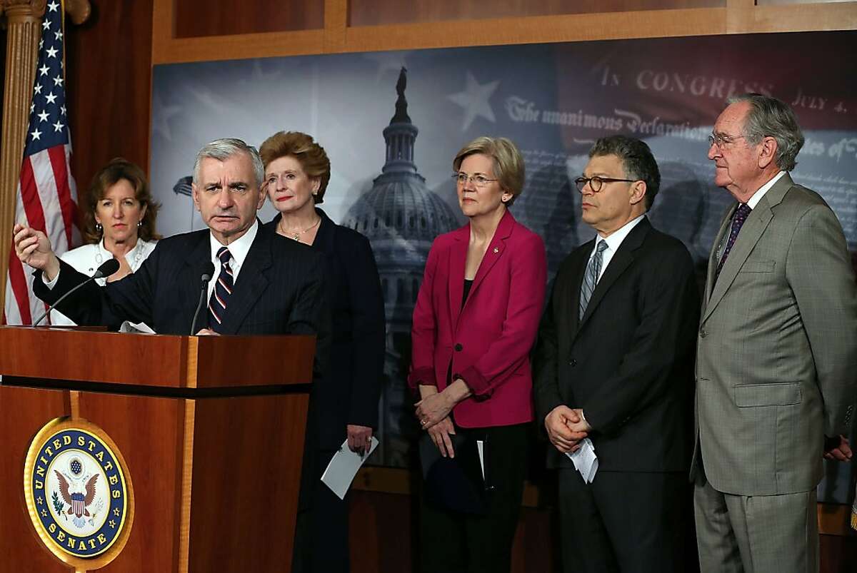 WASHINGTON, DC - JUNE 27: Sen. Jack Reed, (D-RI) (2nd-L) talks about student loans while flanked by (L-R) Sen. Kay Hagan (D-NC), Sen. Debbie Stabenow (D-MI), Sen. Elizabeth Warren (D-MA), Sen. Al Franken (D-MN), and Sen. Tom Harkin, D-IA), during a news conference on Capitol Hill, June 27, 2013 in Washington, DC. The Senators spoke about solutions to keep student loans from doubling on July 1st. (Photo by Mark Wilson/Getty Images)
