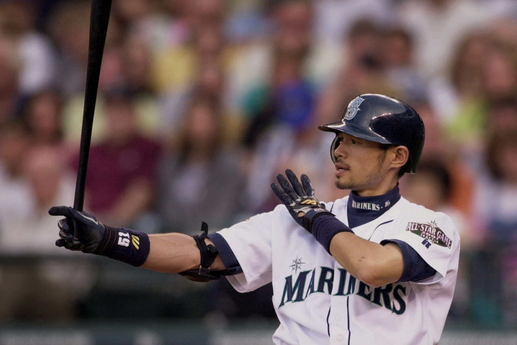 Seattle Mariners' Ichiro Suzuki holds his bat as he stands in the