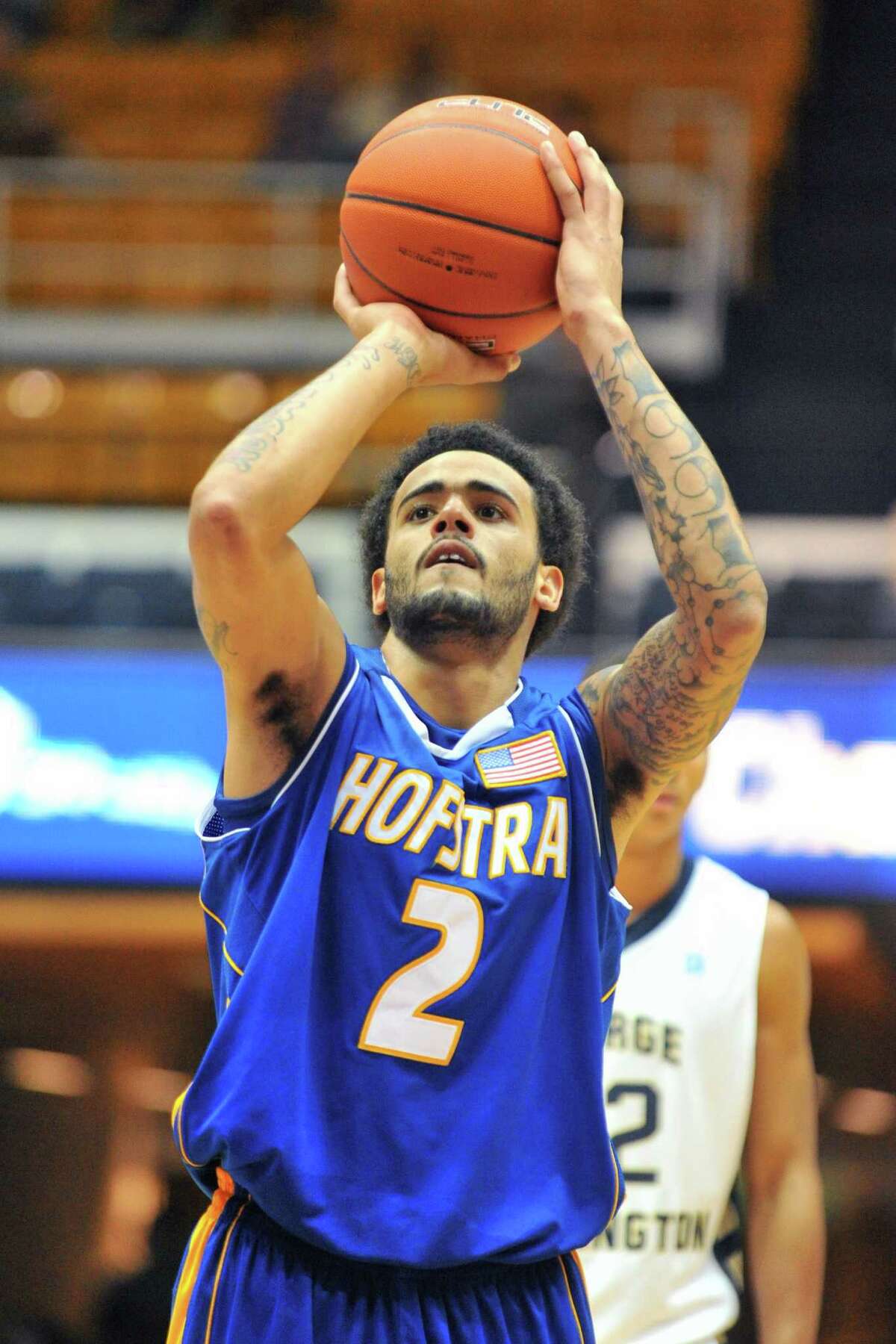 WASHINGTON, DC - NOVEMBER 24: Taran Buie #2 of the Hofstra Pride takes a foul shot during the game against the George Washington Colonials on November 24, 2012 at the Smith Center in Washington, DC. The Colonials won 80-56. (Photo by Mitchell Layton/Getty Images)