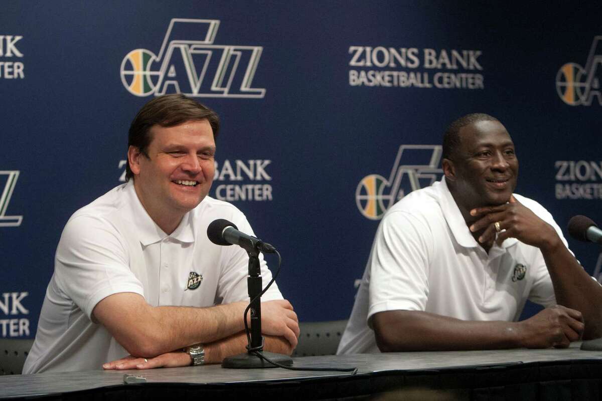 Jazz general manager Dennis Lindsey and Utah Jazz head coach Tyrone Corbin talk during a press conference at the Zions Bank Basketball Center during the NBA draft Thursday June 27, 2013. (AP Photo/The Salt Lake Tribune, Chris Detrick)