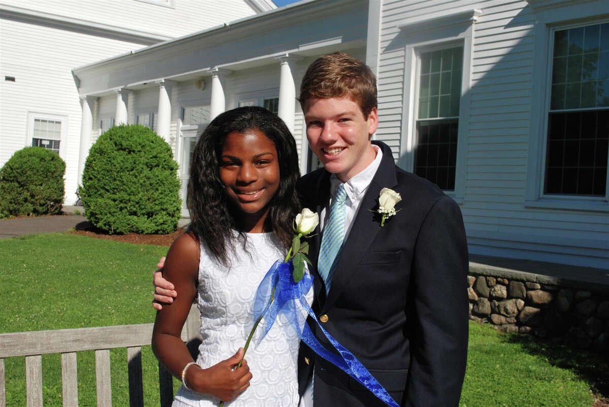 New Canaan Country School Class of 2013 graduates Alyssa Thomas and Henry Seth await the start of the graduation ceremony June 12.
