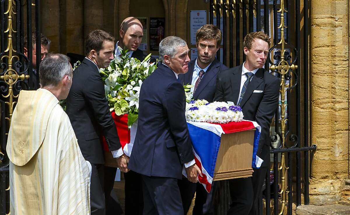 Andrew 'Bart' Simpson funeral. Gold medal winning sailors Sir Ben Ainslie (third left), Iain Percy (second from right) and Paul Goodison (right) carry the coffin of their close friend, Andrew 'Bart' Simpson, from Sherborne Abbey in Sherborne, Dorset. Picture date: Friday May 31, 2013. The Beijing gold medallist and London Olympic silver medallist died when the Artemis America's Cup catamaran capsized and broke up during a training exercise in San Francisco on May 9 2013. See PA story FUNERAL Simpson. Photo credit should read: Chris Ison/PA Wire URN:16678556