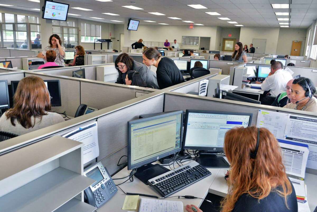 Training session in the call center of the new Justice Center for the Protection of People with Special Needs headquarters in Delmar, NY, Friday June 28, 2013. (John Carl D'Annibale / Times Union)