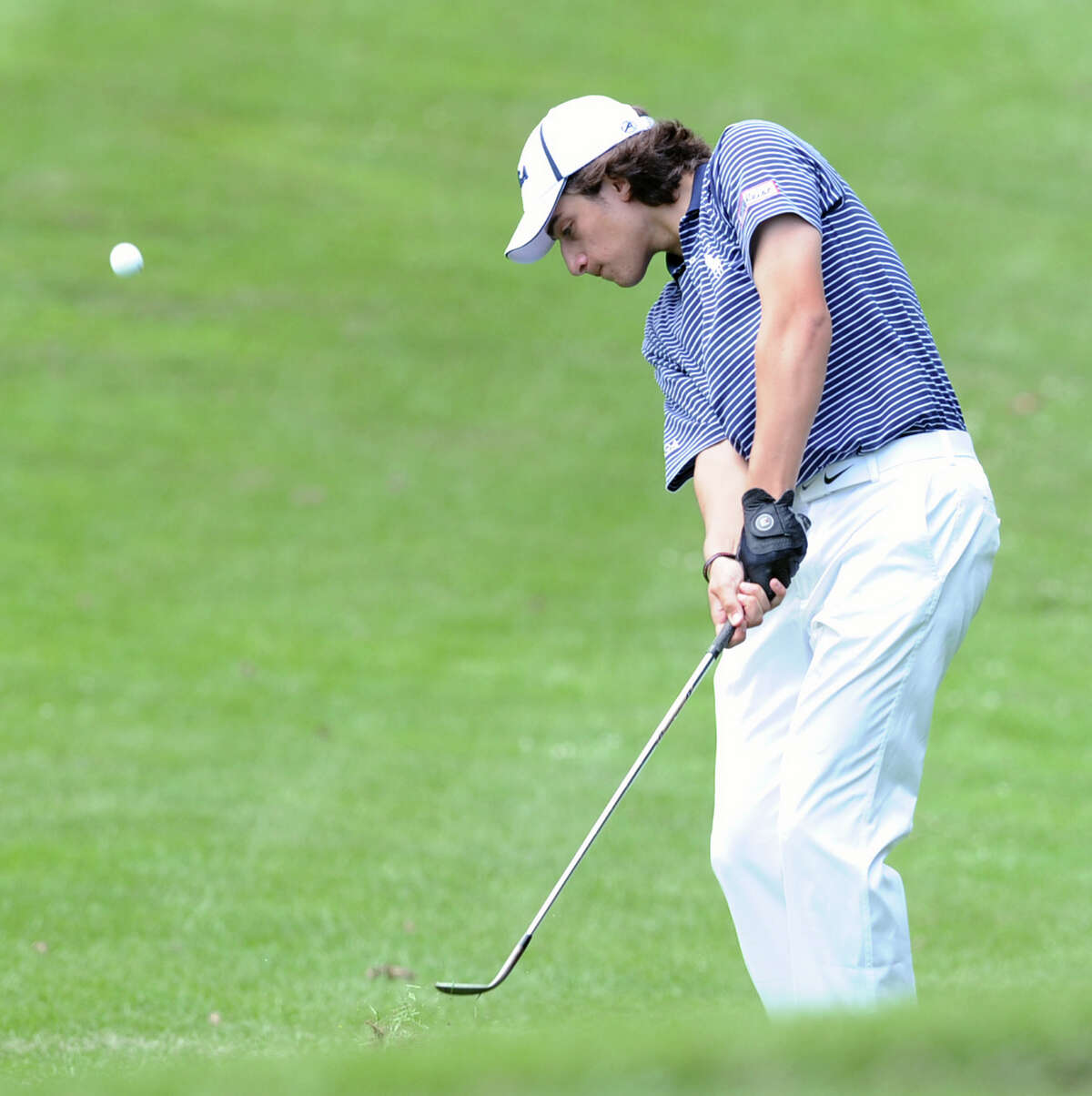 Paul Pastore hits from the second fairway during the Greenwich Town-wide Golf championship at the Griffith E. Harris Memorial Golf Course in Greenwich, Saturday afternoon, June 29, 2013.