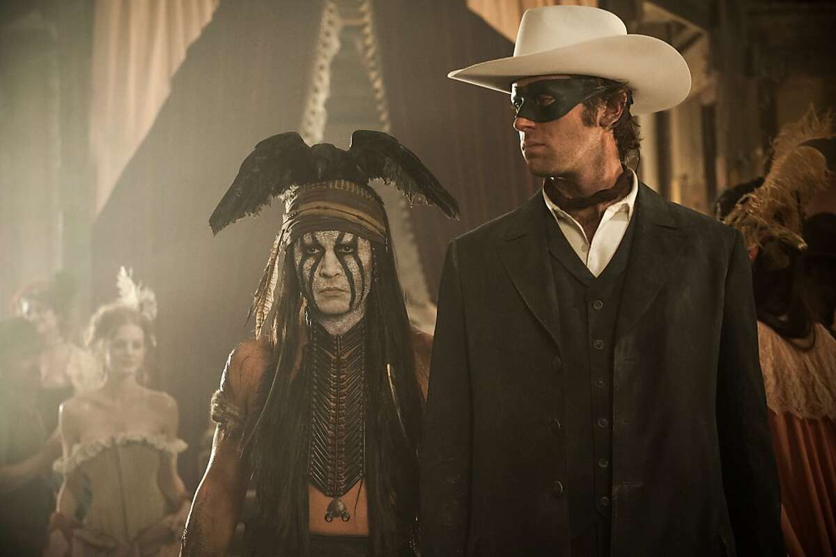 "THE LONE RANGER" L to R: Johnny Depp as Tonto and Armie Hammer as The Lone Ranger