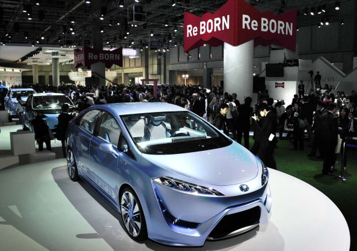 Japan's auto giant Toyota Motor displays the concept fuel cell vehicle "FCV-R" at a press preview of the Tokyo Motor Show on November 30, 2011. The zero-emission four-seater sedan is expecting to be commercialized by 2015. AFP PHOTO / Yoshikazu TSUNO