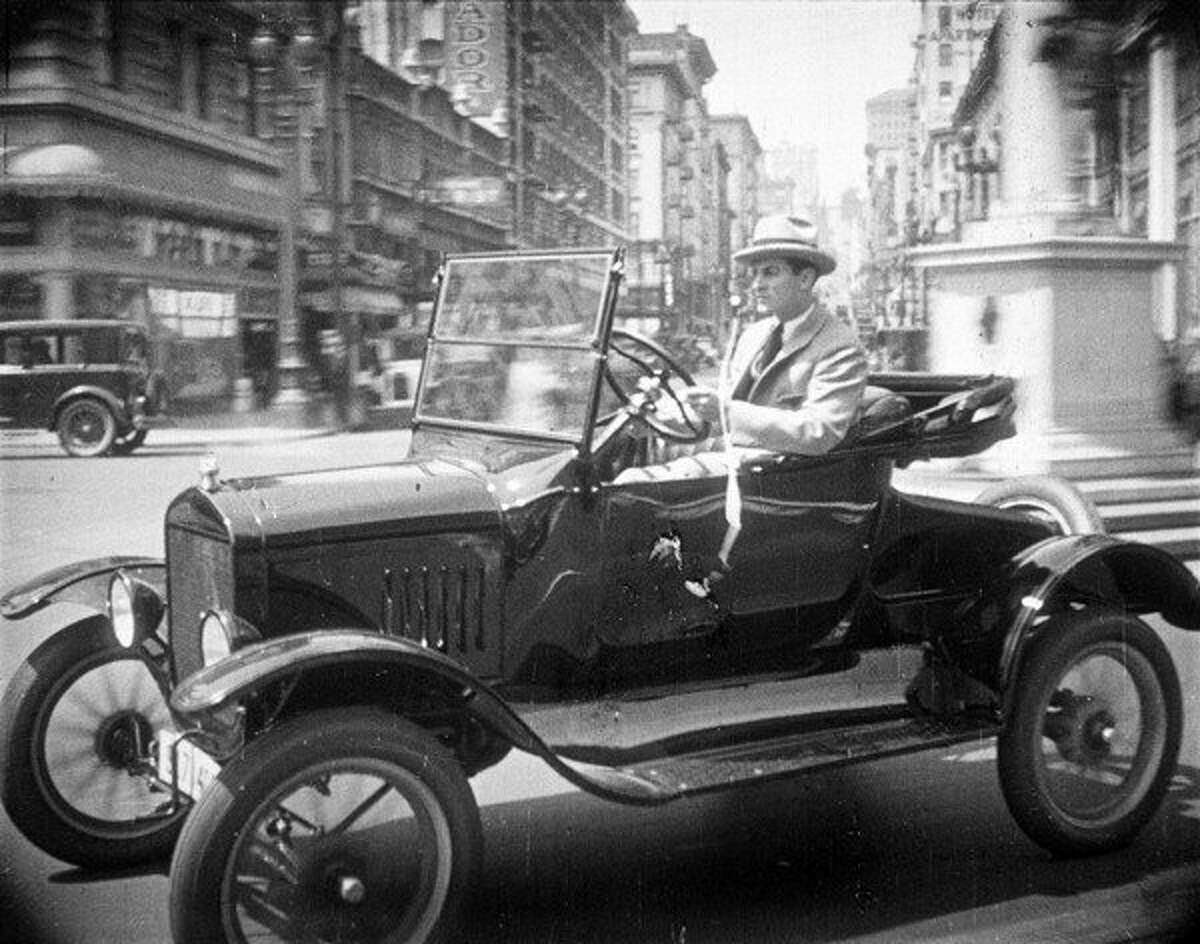Part of the thrilling car chase, with ace Chronicle reporter Clarence Walker (Rex Lease) near Sixth and Market streets, in the 1925 silent film "The Last Edition," screening Sunday, July 14 at the Castro as part of the San Francisco Silent Film Festival.