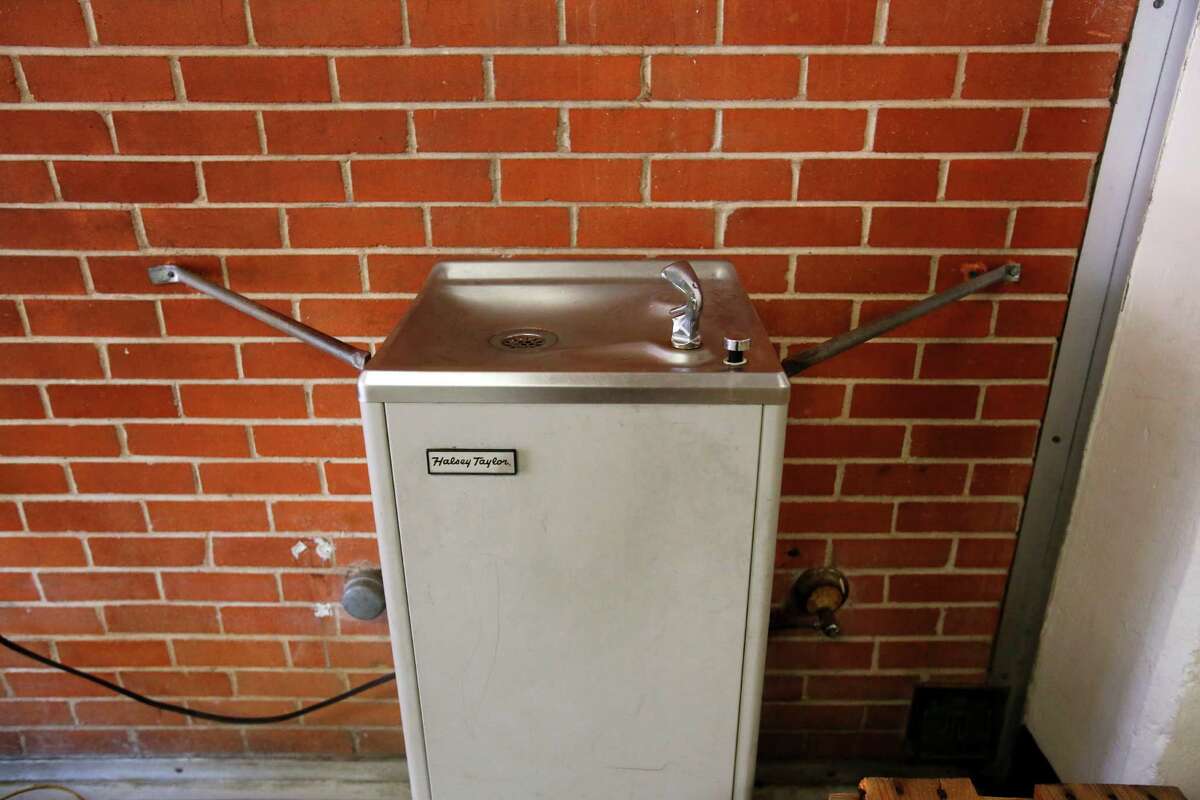 A water fountain is braced to the wall inside North Forest ISD's Fonwood Elementary School, July 2, 2013 in Houston.