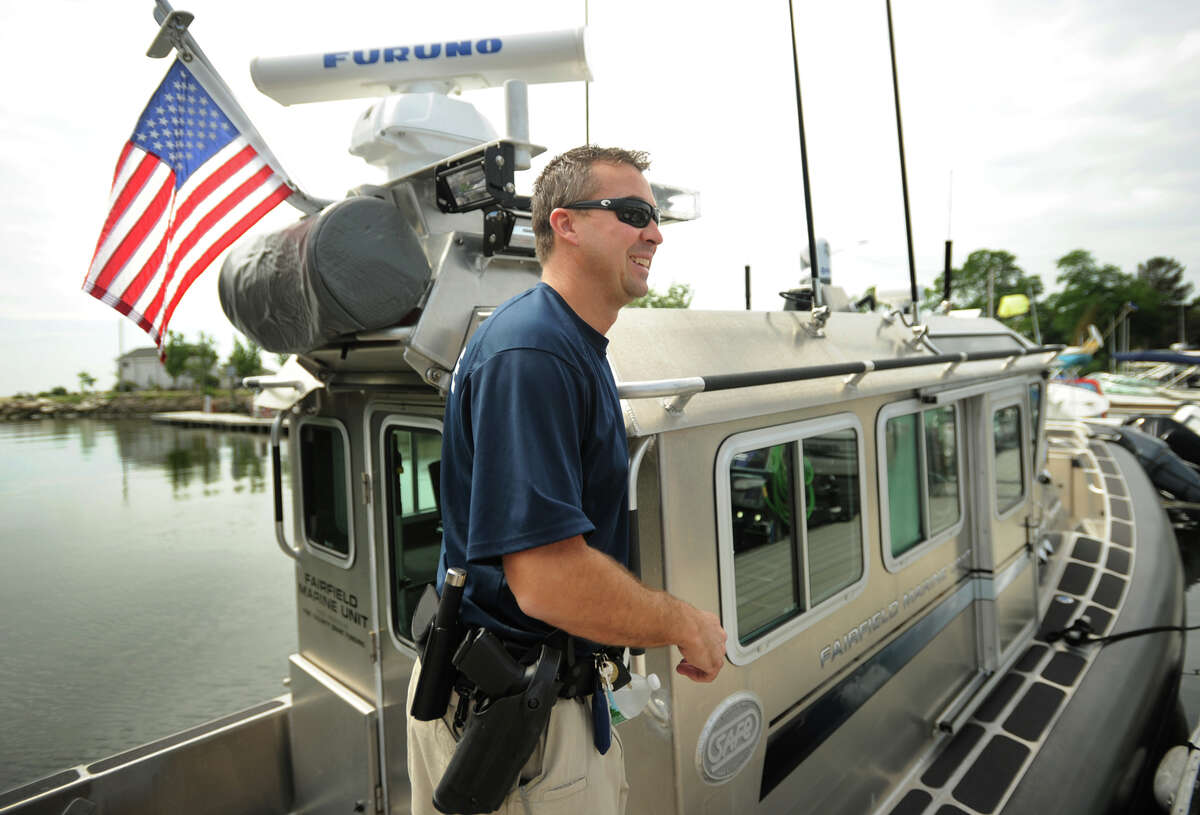 Fairfield Police Marine Unit Officer Jim Wiltsie prepares to embark on a patrol on the unit's state-of-the-art police boat from South Benson Marina in Fairfield, Conn. on Wednesday, July 3, 2013. Wiltsie said the days surrounding the July 4 holiday, because of the many fireworks displays on the Sound, are the units busiest of the year.