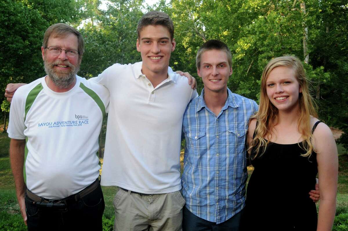 From left: Steve Hupp, Russell Clark, Kyle Denny and Jacqueline Buskop at the Bayou Preservation Association's Young Professionals Party on the Bayou at the home of Kevin and Karen Henry Wednesday June 26, 2013.(Dave Rossman photo)
