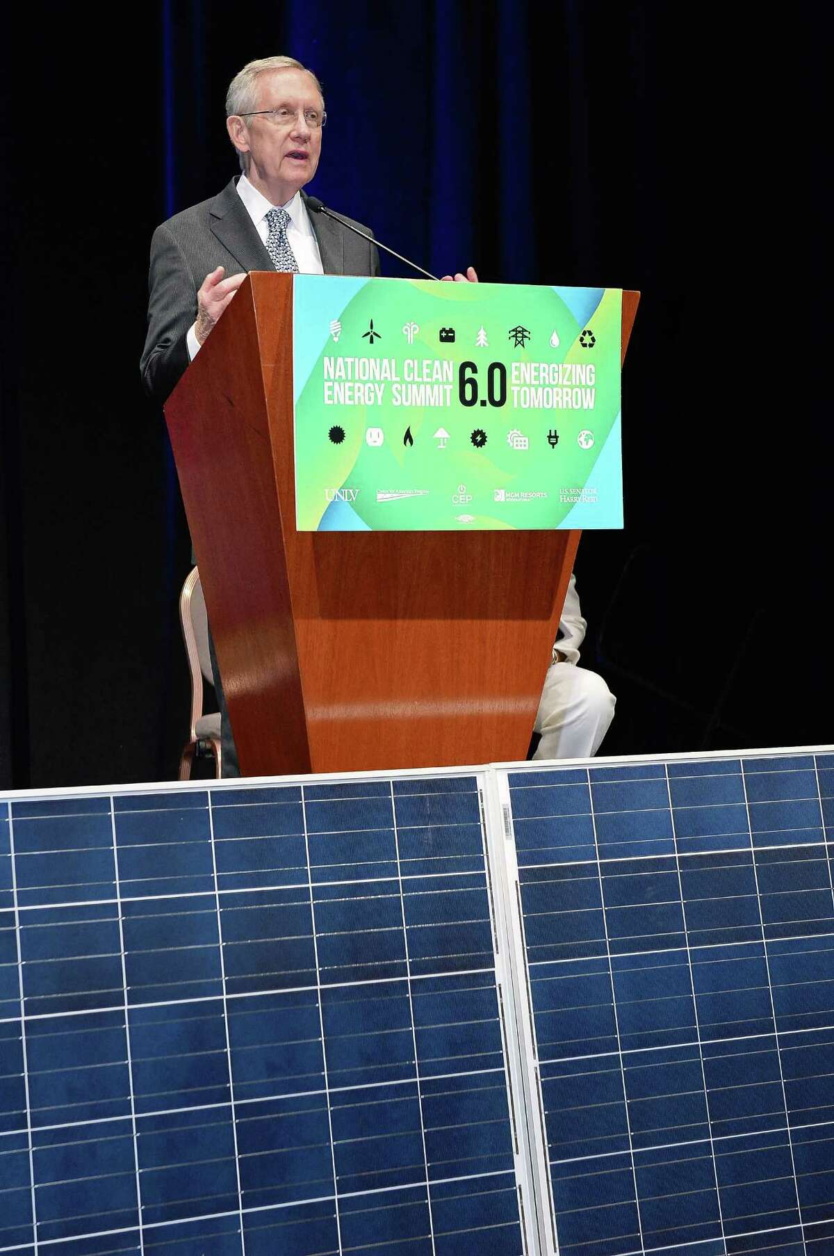 Sen. Harry Reid, D-Nev., speaks at the Mandalay Bay hotel. Reid predicted that the Las Vegas resort will inspire a trend for businesses and homeowners as rooftop solar generation becomes more affordable.