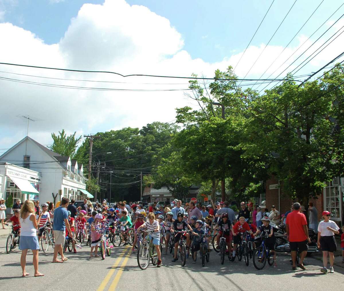 Bikes, trikes, scooters, skates, Oh my! July 4 fun in Southport