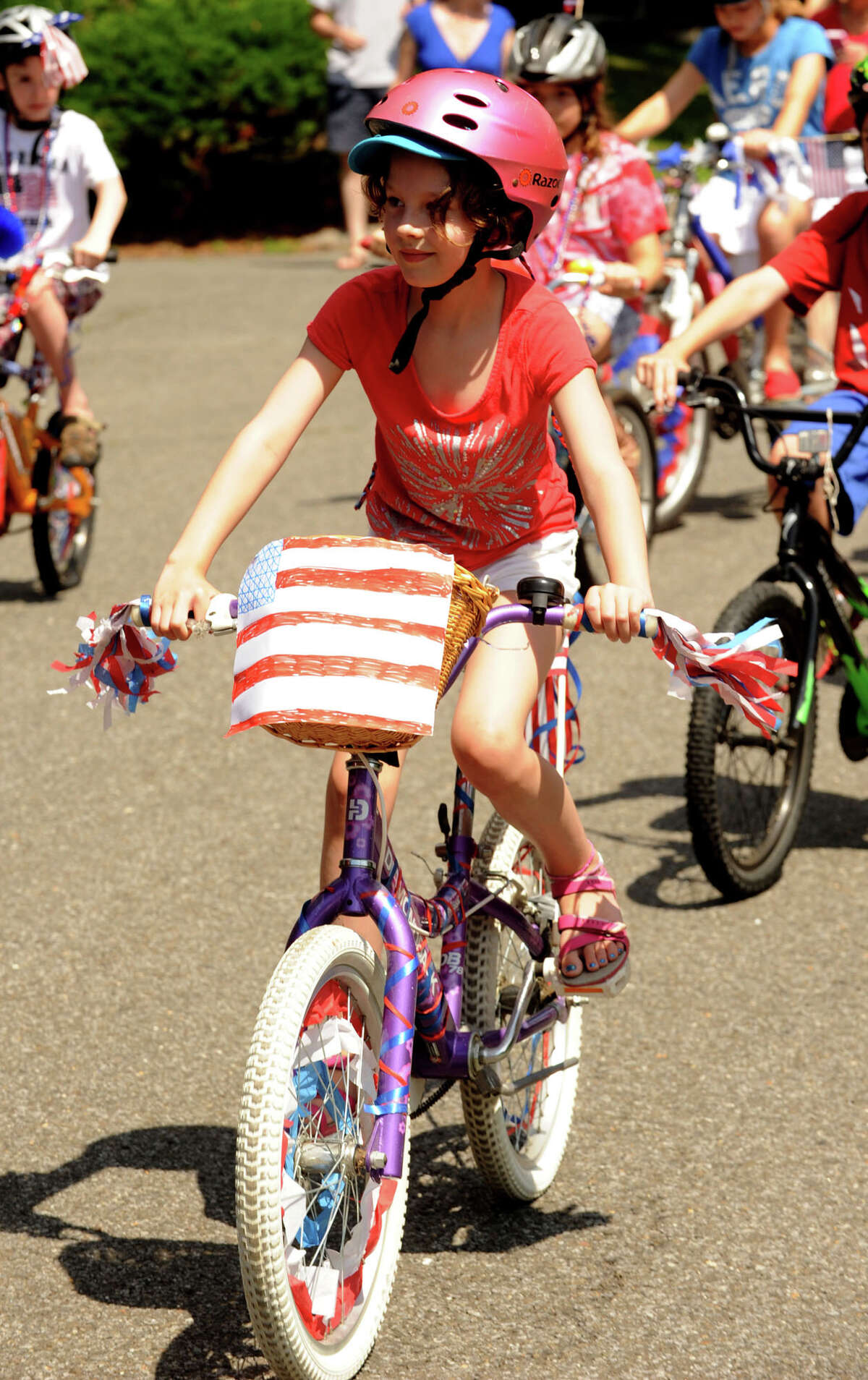 Shoreline communities mark Fourth with bike parades
