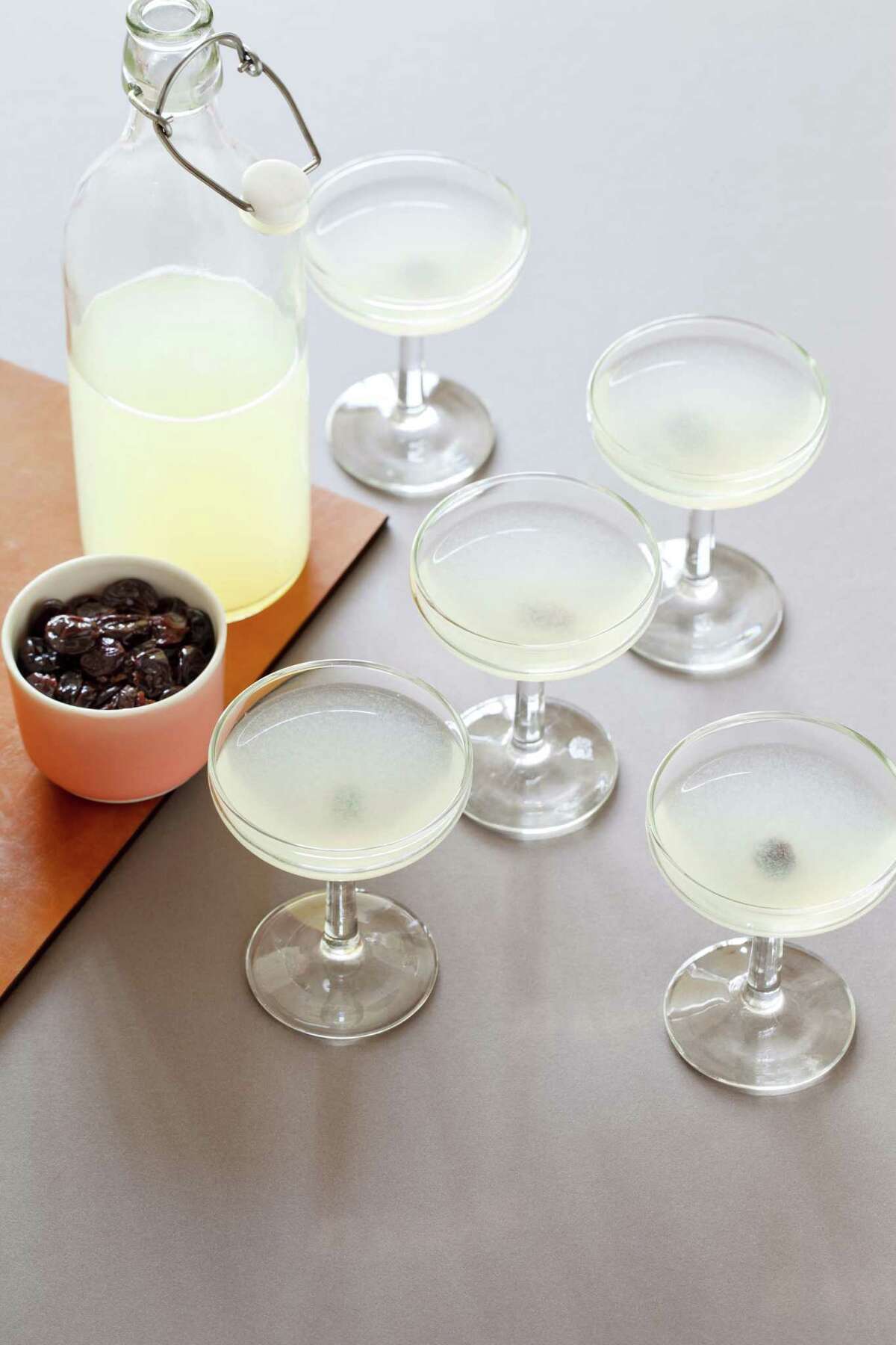 The recipes for the classic Aviation Cocktail and the brandied cherries are included in “Cocktails for a Crowd.”