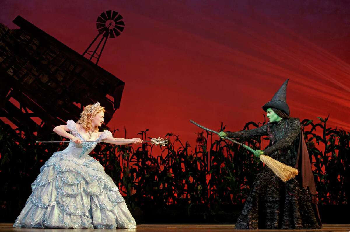 By the time Dorothy's house crash lands in Act 2 of "Wicked," Glinda (Hayley Podschun, left) and Elphaba (Jennifer DiNoia) have evolved from college roommates into sworn enemies, here preparing to do battle.