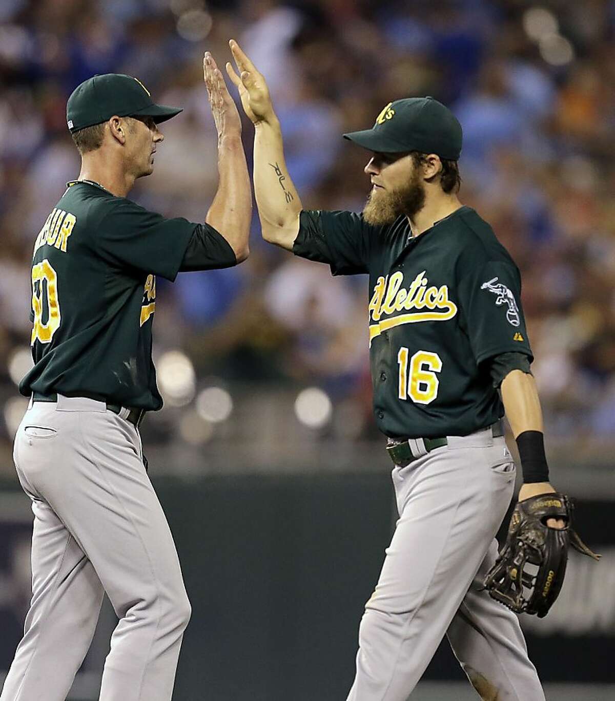 Balfour ties team saves record as A's edge KC