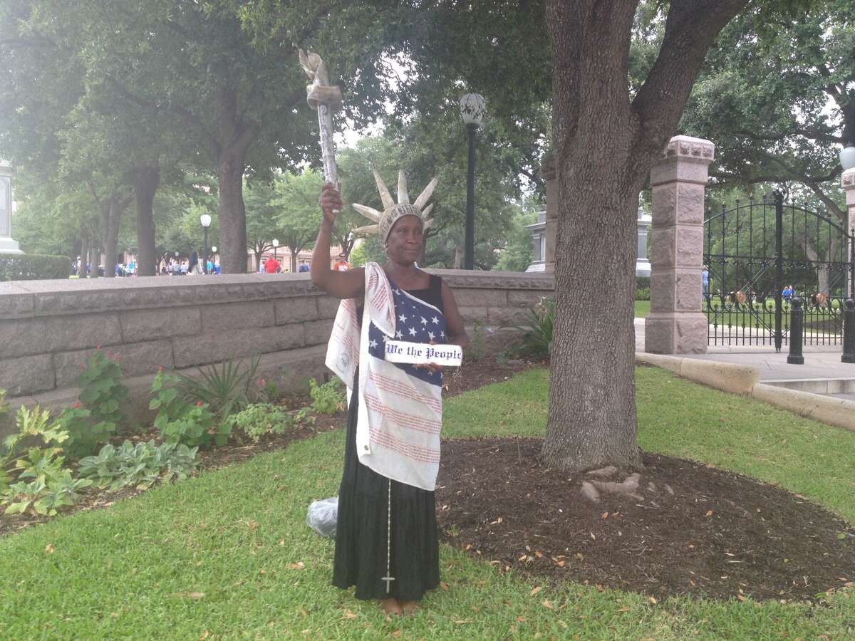 Peace Washington Constanzo protesting silently at Congress Avenue in Austin on July 8, 2013.