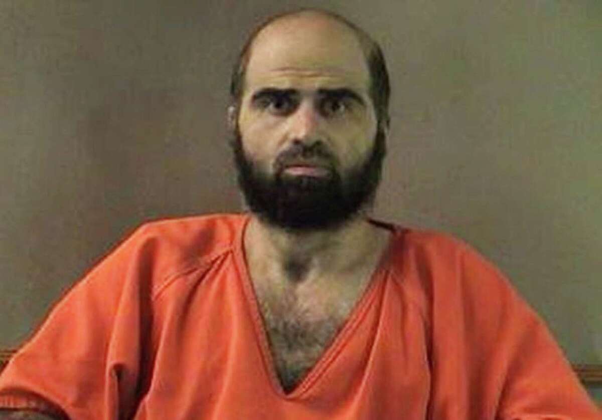 FILE - This undated file photo provided by the Bell County Sheriff's Department shows Nidal Hasan, the Army psychiatrist charged in the 2009 Fort Hood shooting rampage that left 13 dead. Tight security measures are in place at the Texas Army post and neighboring city of Killeen in preparation for the start of jury selection Tuesday, July 9, 2013, Hasan's capital murder trial. (AP Photo/Bell County Sheriff's Department, File)