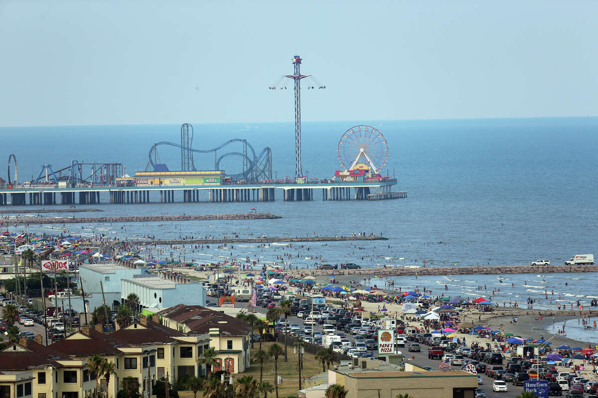 The Historic Pleasure Pier amusement park, Seawall Boulevard and beaches of Galveston Island, Texas, are seen from atop the San Luis Resort on Thursday, July 4, 2013. The Historic Pleasure Pier amusment park, seawall, and beaches of Galveston Island, Texas are seen from atop the San Luis Resort on Thursday, July 4, 2013. (AP Photo/Dr. Scott M. Lieberman) STAND ALONE
