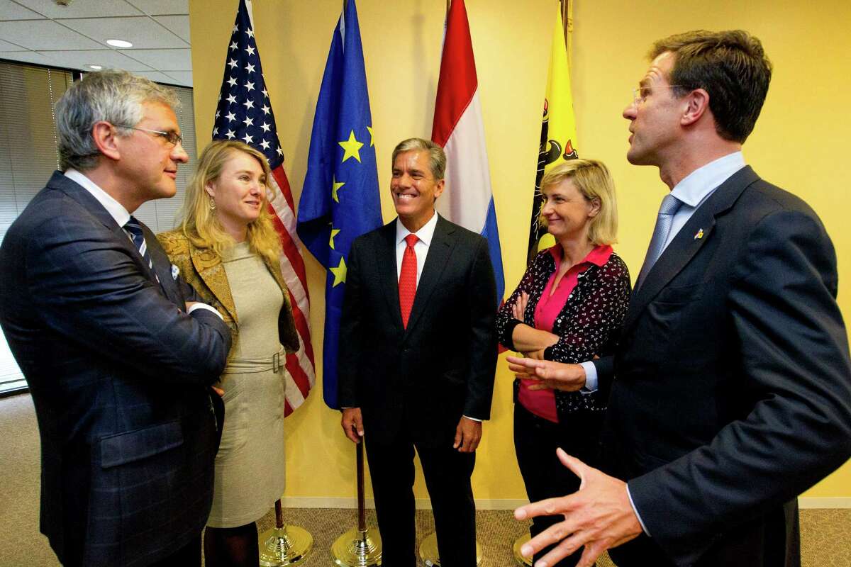From left, Flemish Prime Minister Kris Peeters, Minister of Infrastructure and the Environment of Netherlands Melanie Schultz van Haegen, Shell Oil Co. President Marvin Odum, Flemish Minister of Mobility and Public Works Hilde Crevits and Dutch Prime Minister Mark Rutte gather on Tuesday after a speech at Pennzoil Place in downtown Houston.