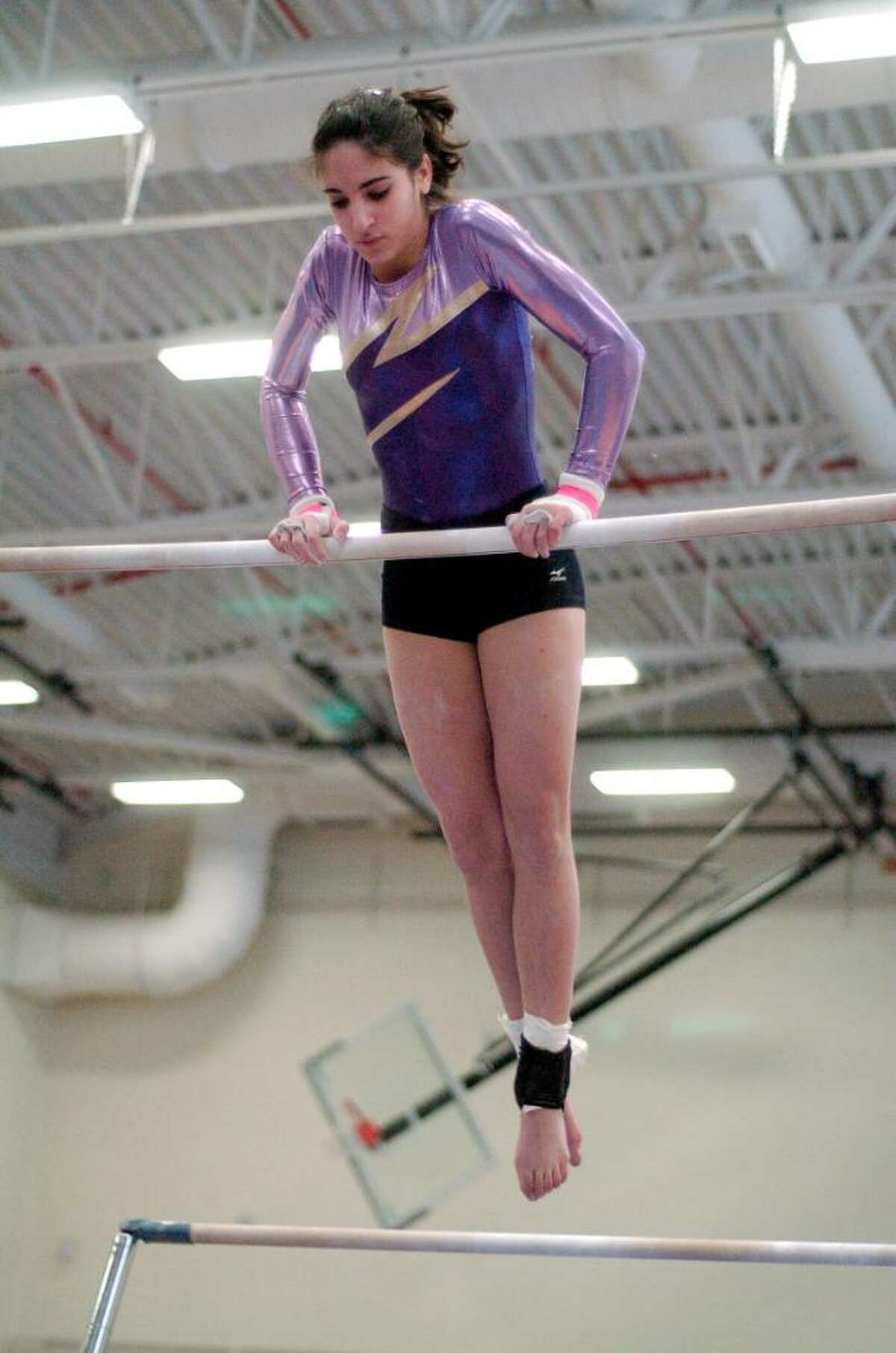 Jordan Schechtman from Westhill competes at the gymnastics meet at Westhill High School in Stamford, Conn. on Monday January 18, 2010. Westhill and Pomperaug are two of the schools competing.