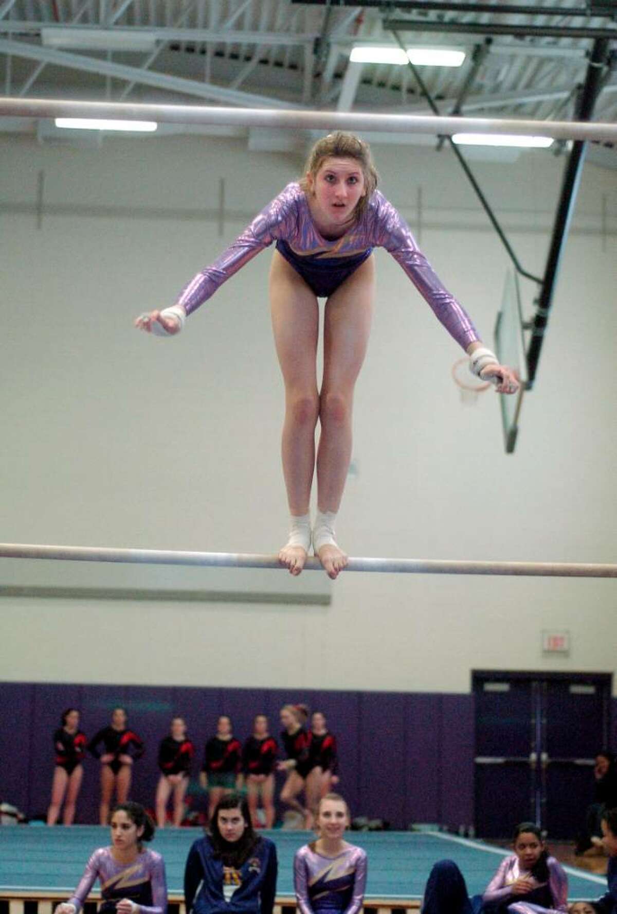 Christina Zendman from Westhill High School competes at gymnastics meet at Westhill High School in Stamford, Conn. on Monday January 18, 2010. Westhill and Pomperaug are two of the schools competing.