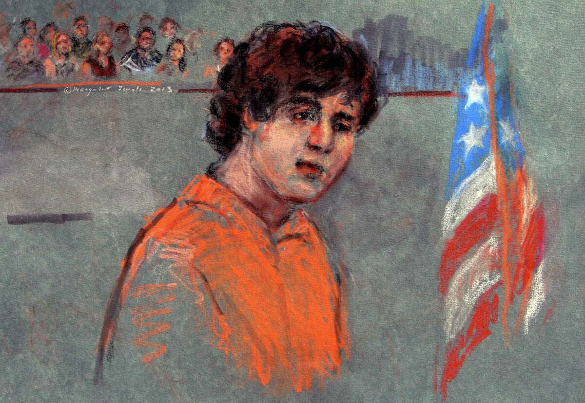 This courtroom sketch depicts Boston Marathon bombing suspect Dzhokhar Tsarnaev during arraignment in federal court Wednesday, July 10, 2013 in Boston. The 19-year-old has been charged with using a weapon of mass destruction, and could face the death penalty. (AP Photo/Margaret Small) ORG XMIT: BX115