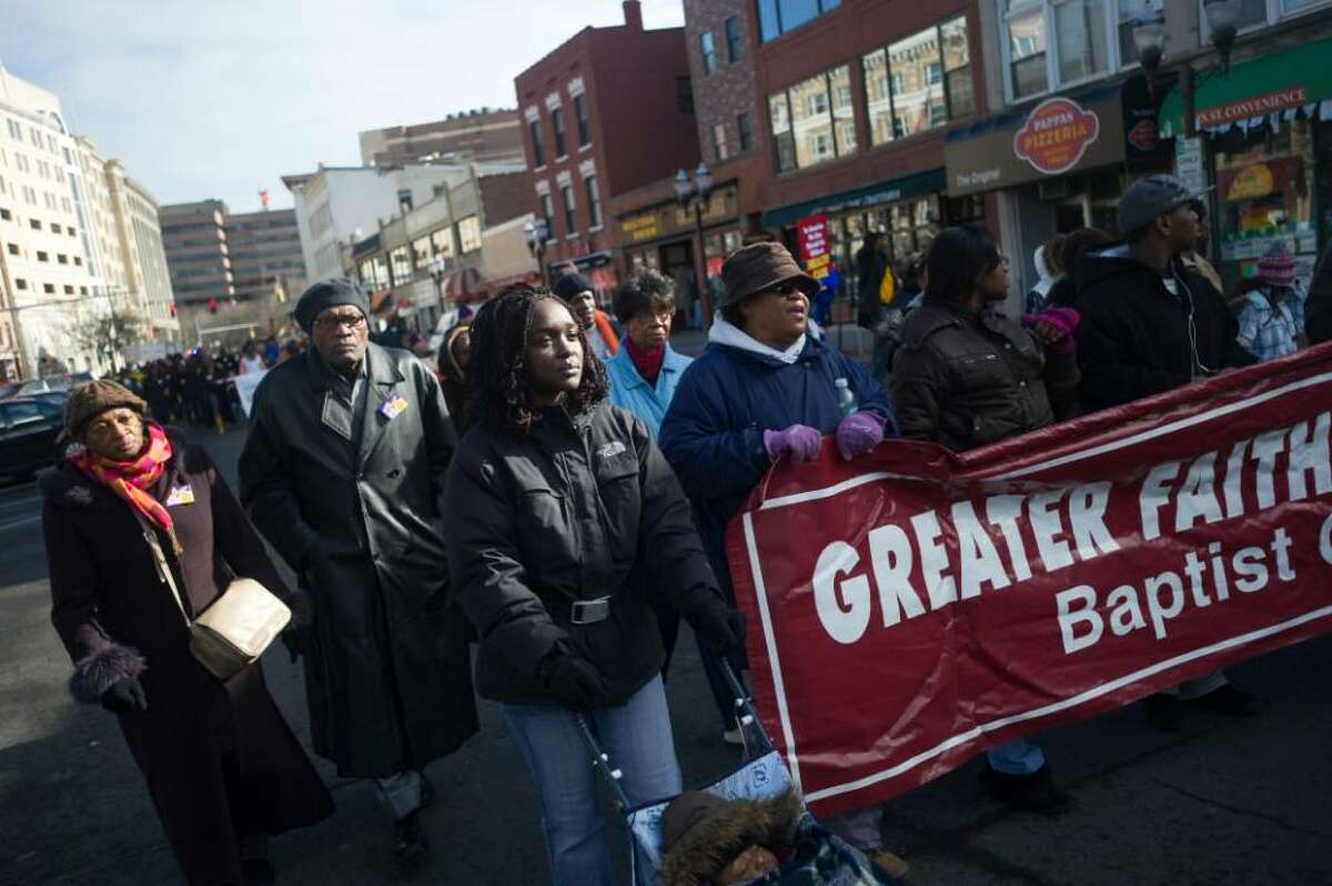 Marchers head down Main St. during the Annual MLK March in Stamford, Conn. on Monday, Jan. 18, 2010.
