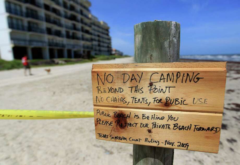 Galveston Wants To Eliminate Beach Squatters Houston Chronicle A Small Hand Painted Sign Reads No Day Camping Beyond This Point Chairs