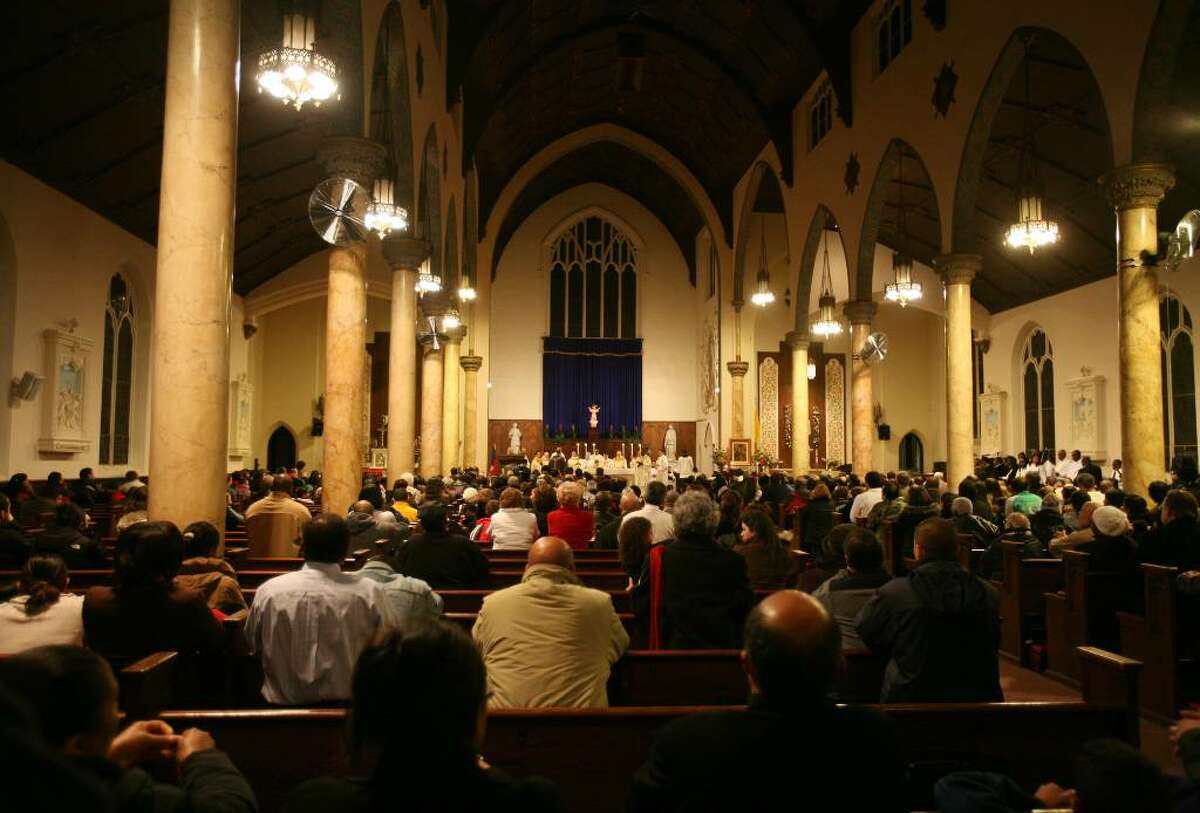 Memorial mass for victims of the Haitian earthquake at St. Charles Borromeo Church in Bridgeport on Monday, January 18, 2010.