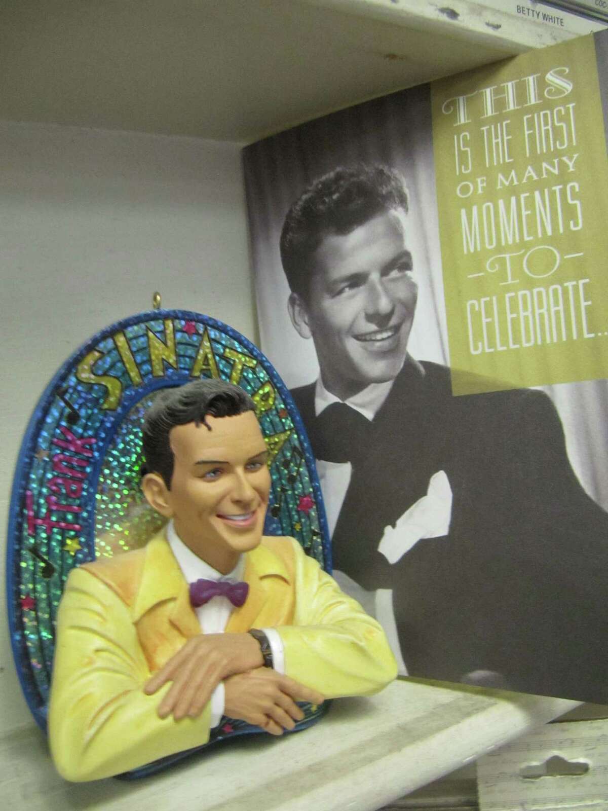 Frank Sinatra is Sally White's favorite singer, and Old Blue Eyes memorabilia has adorned her shop.