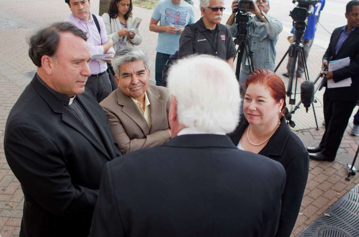 The Rev. David Roschke, left, a Lutheran pastor from Houston, Johnny Mata with the Greater Houston Coalition for Justice, and Kathryn Kase, co-counsel for Duane Buck, spoke with former Texas Gov. Mark White in March before he told a media gathering that race played an unfair role in Buck's 1997 murder trial and urged "a new, fair sentencing." Accie Smith, sister of one of Buck's victims, says while there are prejudices in the justice system, Buck's death sentence was fair.