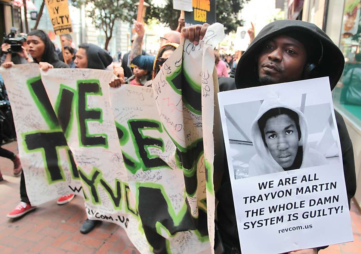 Protesters march during a rally denouncing the not guilty verdict in the George Zimmerman murder trial in San Francisco on Sunday, July 14, 2013.