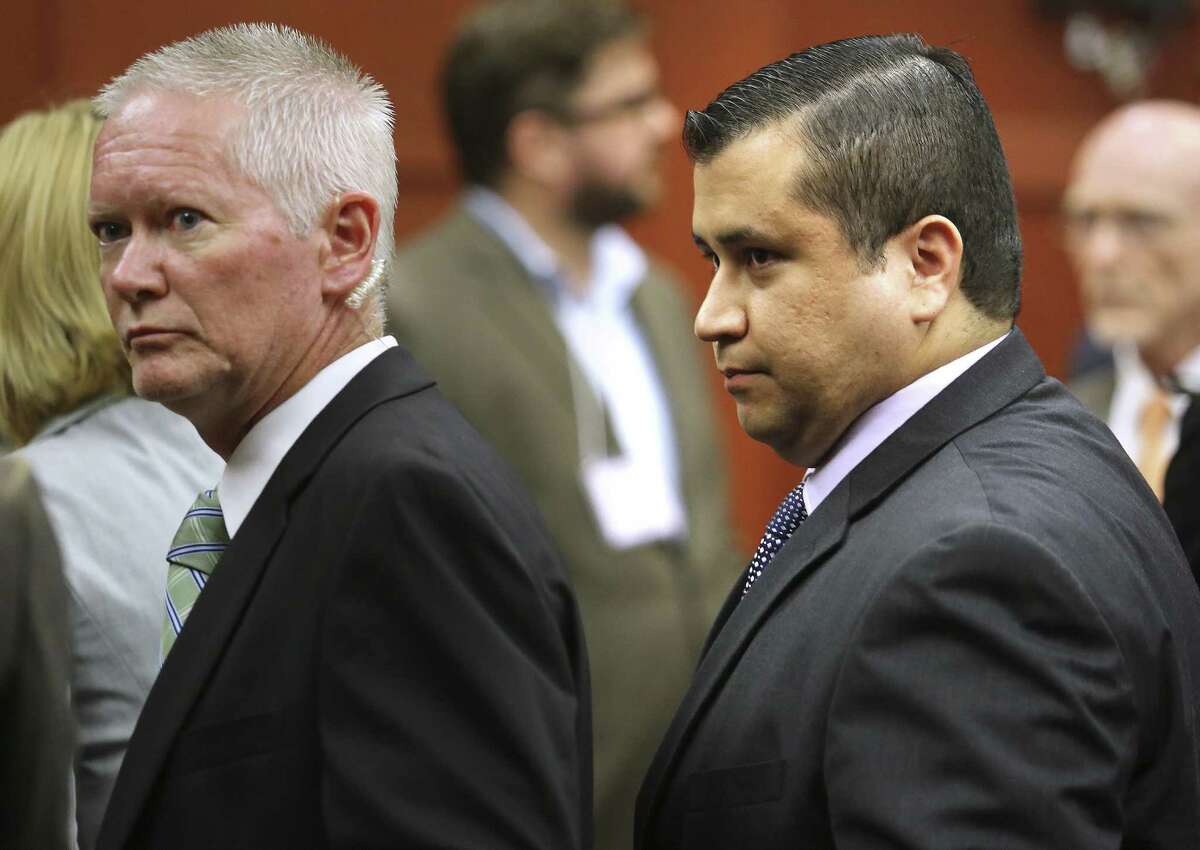 George Zimmerman (right) leaves court after his not guilty verdict was read Saturday. Readers weigh in both sides of the controversial trial.