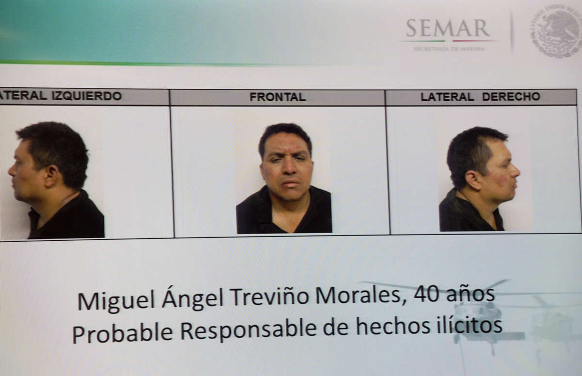 With the arrest of Miguel Angel Trevino Morales, 40, the leader of the Mexican drug cartel, Los Zetas, renewed attention is being put on the brutal gang.Above: A picture taken from a screen of the alleged leader of the drug Mexican cartel "Los Zetas", Miguel Angel Trevino Morales, presented in combo pictures during a press conference at the headquarters of the Interior Ministry on July 15, 2013 in Mexico City. According to a spokesman Trevino was arrested early morning during a military operation en Nuevo Laredo.