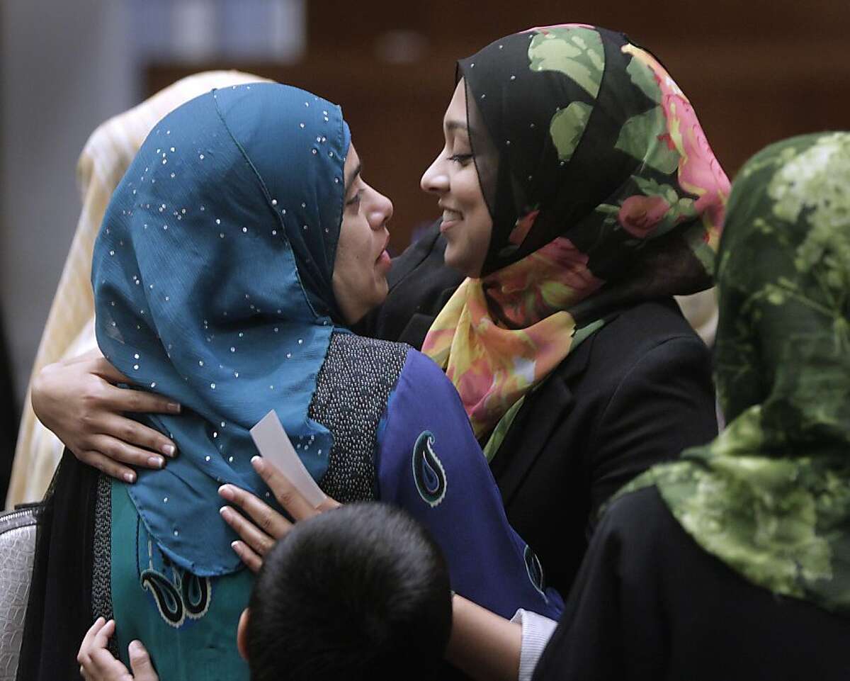 Sadia Saifuddin (right), a Muslim student at UC Berkeley, embraces her mother Afsham, after Sadia was confirmed as a student regent at a meeting of the UC Board of Regents in San Francisco, Calif. on Wednesday, July 17, 2013. Saifuddin has been criticized by some for her views on certain Israeli and Jewish political issues.