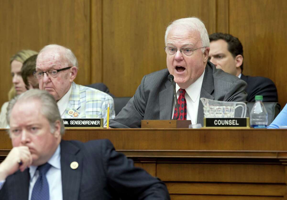 Rep. Jim Sensenbrenner, R-Wis., (right) who originally sponsored the Patriot Act governing the collection of phone records, questions security agency witnesses Wednesday on Capitol Hill.