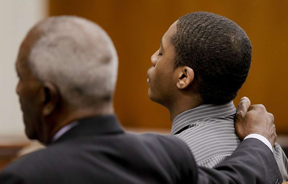A jury delivered a guilty verdict, at the Contra Costa County Courthouse in Martinez, Calif 18, 2013, against defendant Marcelles Peter, (right), charged in the gang-rape of a 16 year old girl at Richmond High School in October of 2009, as he listened with his attorney Gordon Brown (left).