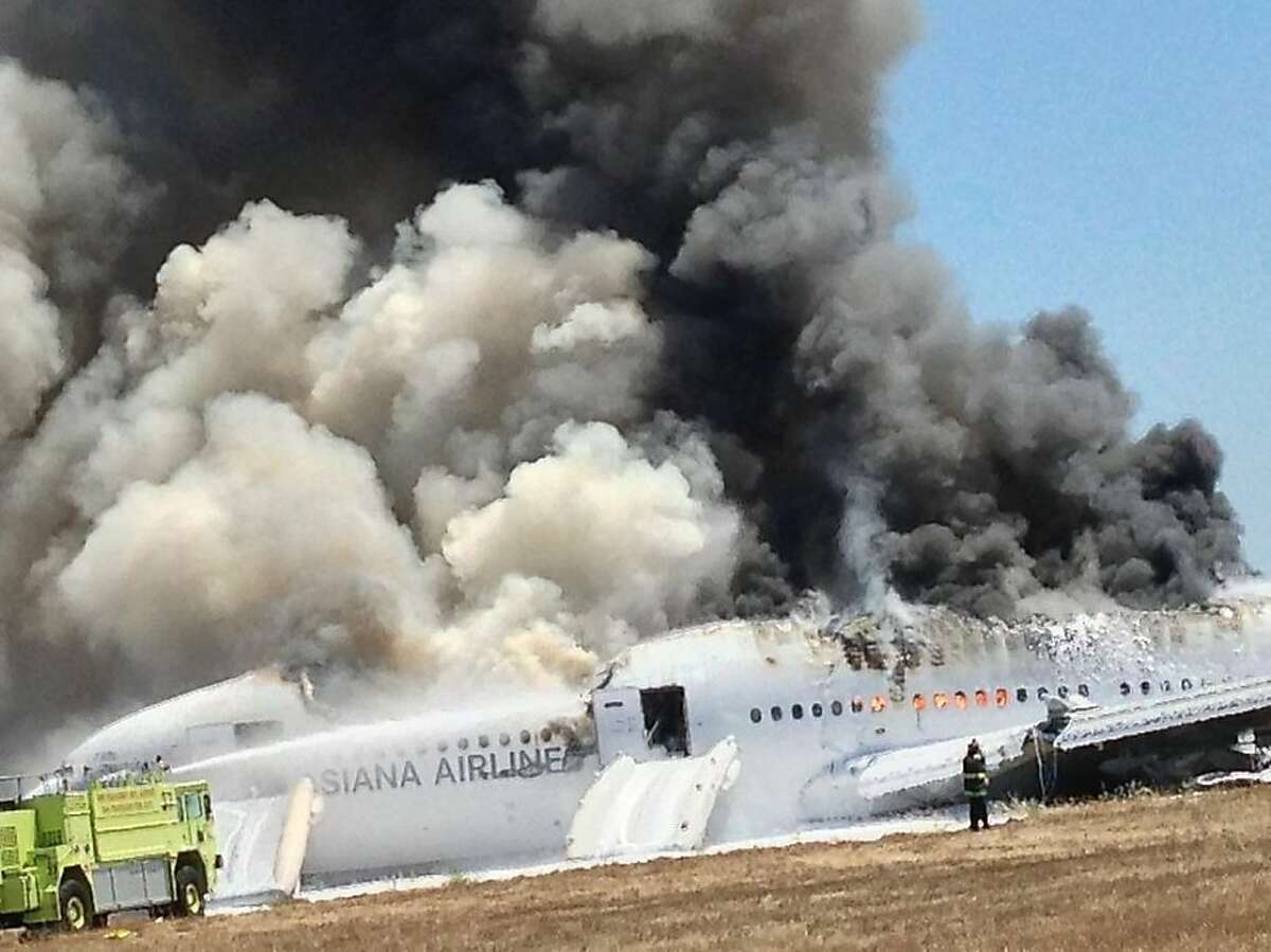 Photo taken by Asiana Flight 214 passenger Eugene Anthony Rah show the immediate aftermath of the crash at SFO on July 6, 2013 in San Francisco California.