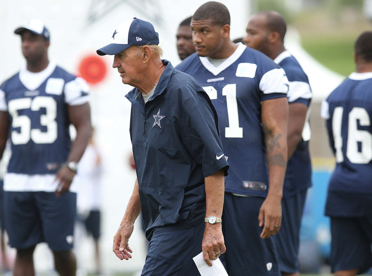 Defensive coordinator Monte Kiffin (center) oversees practice at the Dallas Cowboys training camp on Sunday, July 21, 2013 in Oxnard.