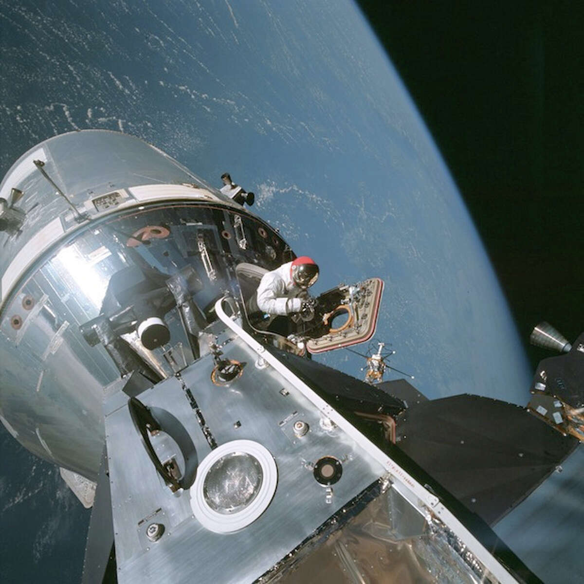 Astronaut Dave Scott comes out of the Apollo 9 command module.