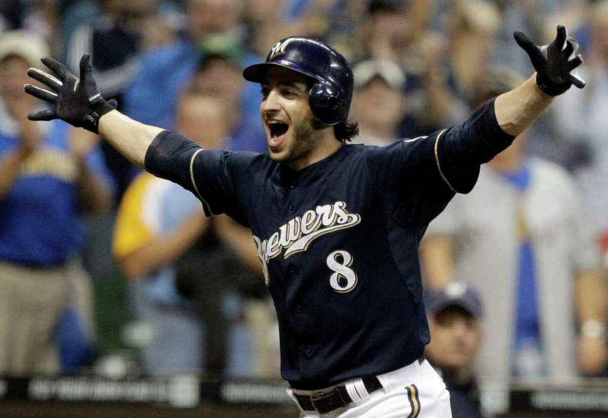 FILE - In this Sept. 13, 2011 file photo, Milwaukee Brewers' Ryan Braun reacts after hitting a game-winning home run during the 11th inning of a baseball game against the Colorado Rockies, in Milwaukee. Braun won the National League MVP Award in voting announced Tuesday, Nov. 22, 2011. (AP Photo/Morry Gash)